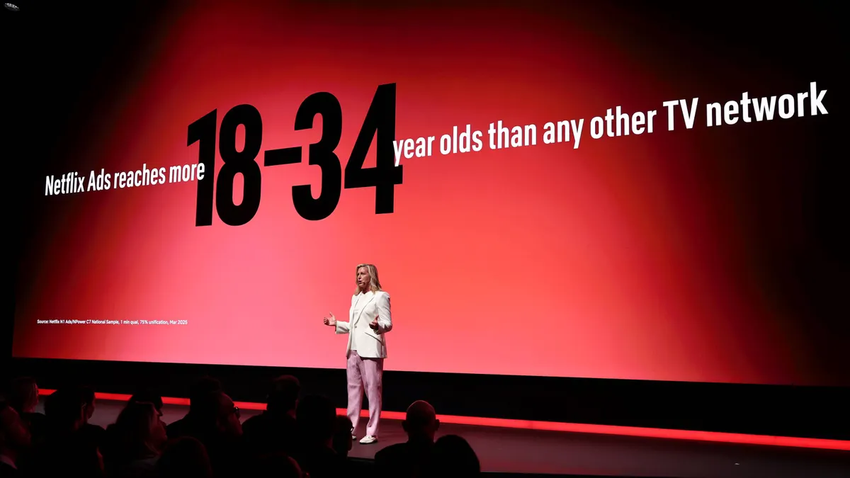 Netflix president of ads Amy Reinhard on stage at the streamer's 2025 upfront presentation