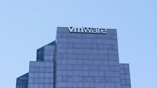 A tall office building with the VMware logo prominently displayed