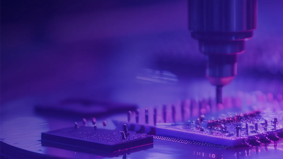 Manufacturing machinery with a purple overlay.