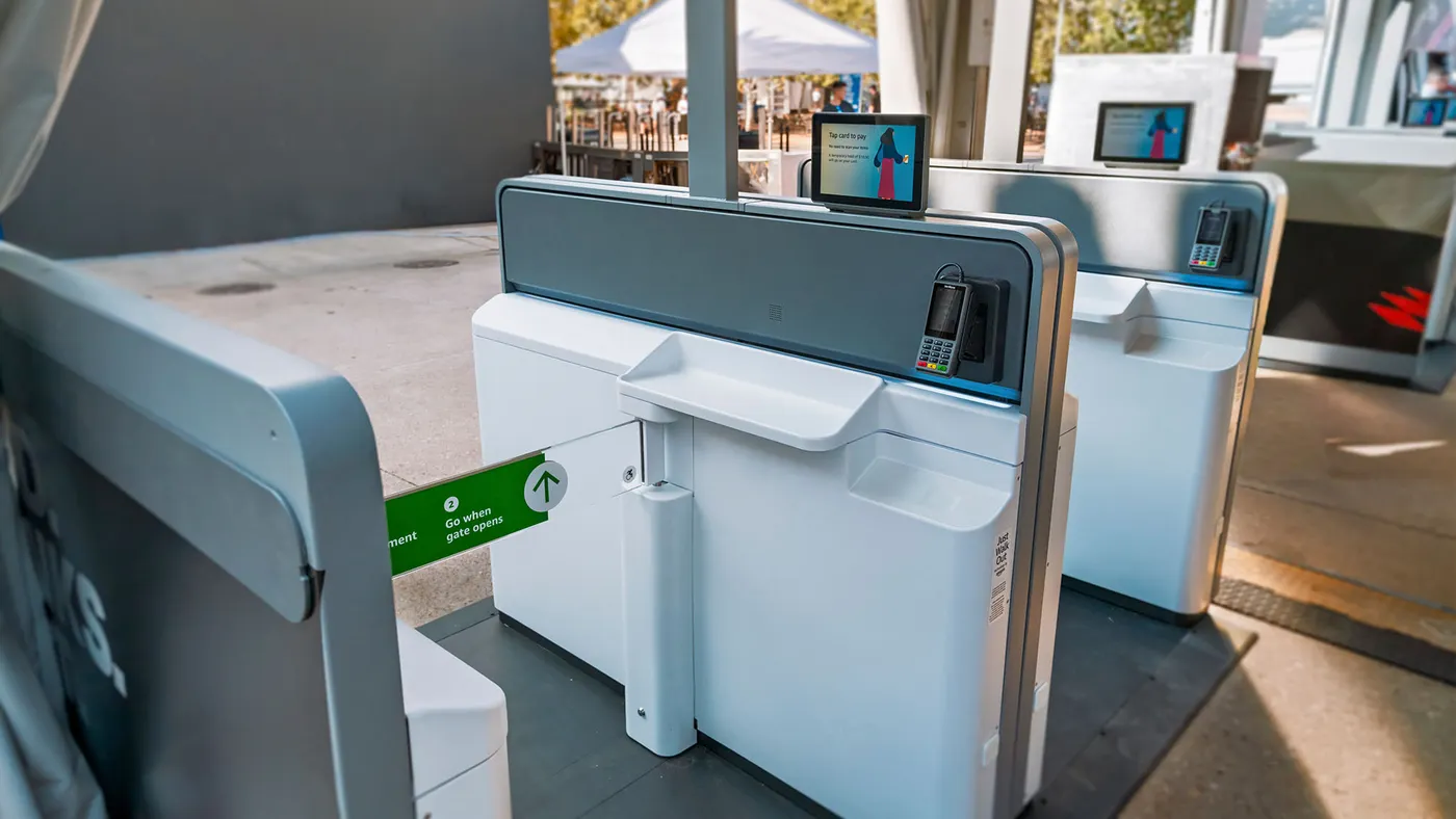 A group of payment lanes at a venue.