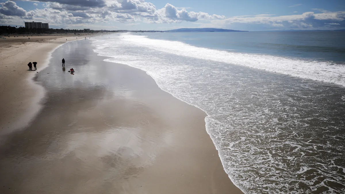 Ocean meets sandy beach