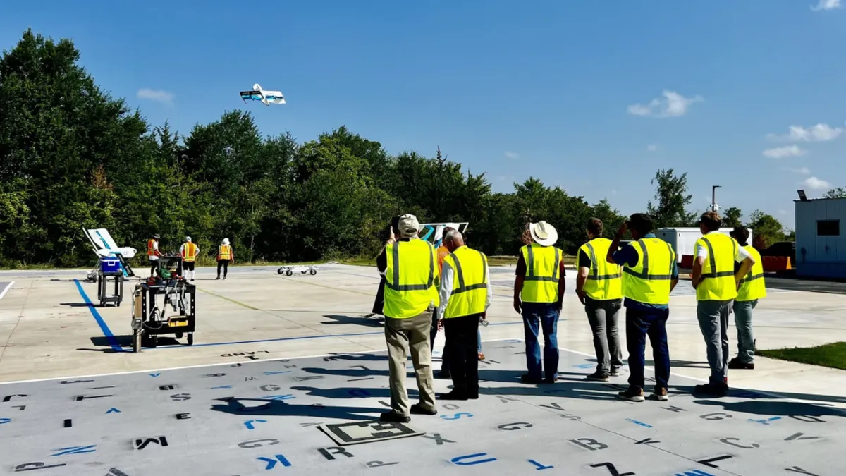 An Amazon drone takes flight.