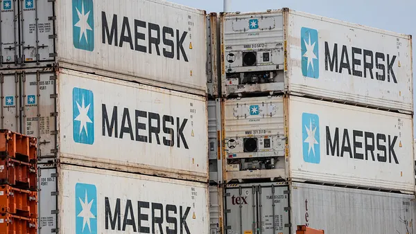 Refrigerated containers stacked at a container terminal.