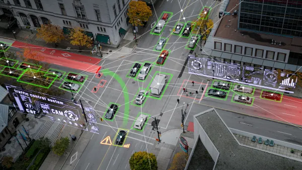 An illustration shows an overhead view of a city intersections with imaginary lines extending from each vehicle to other nearby vehicles.