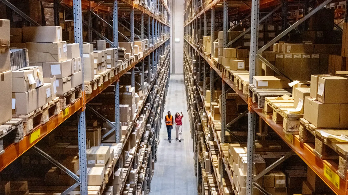 People walking in a warehouse