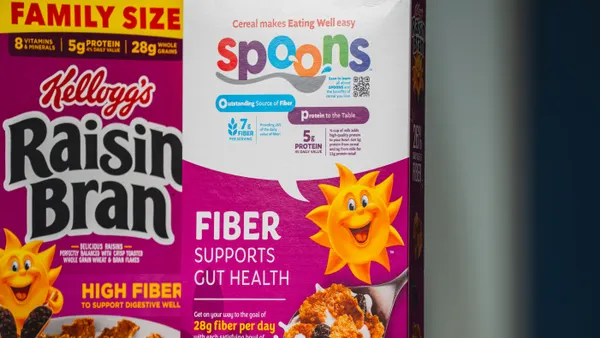A box of WK Kellogg's cereal with a SPOONS nutrion label