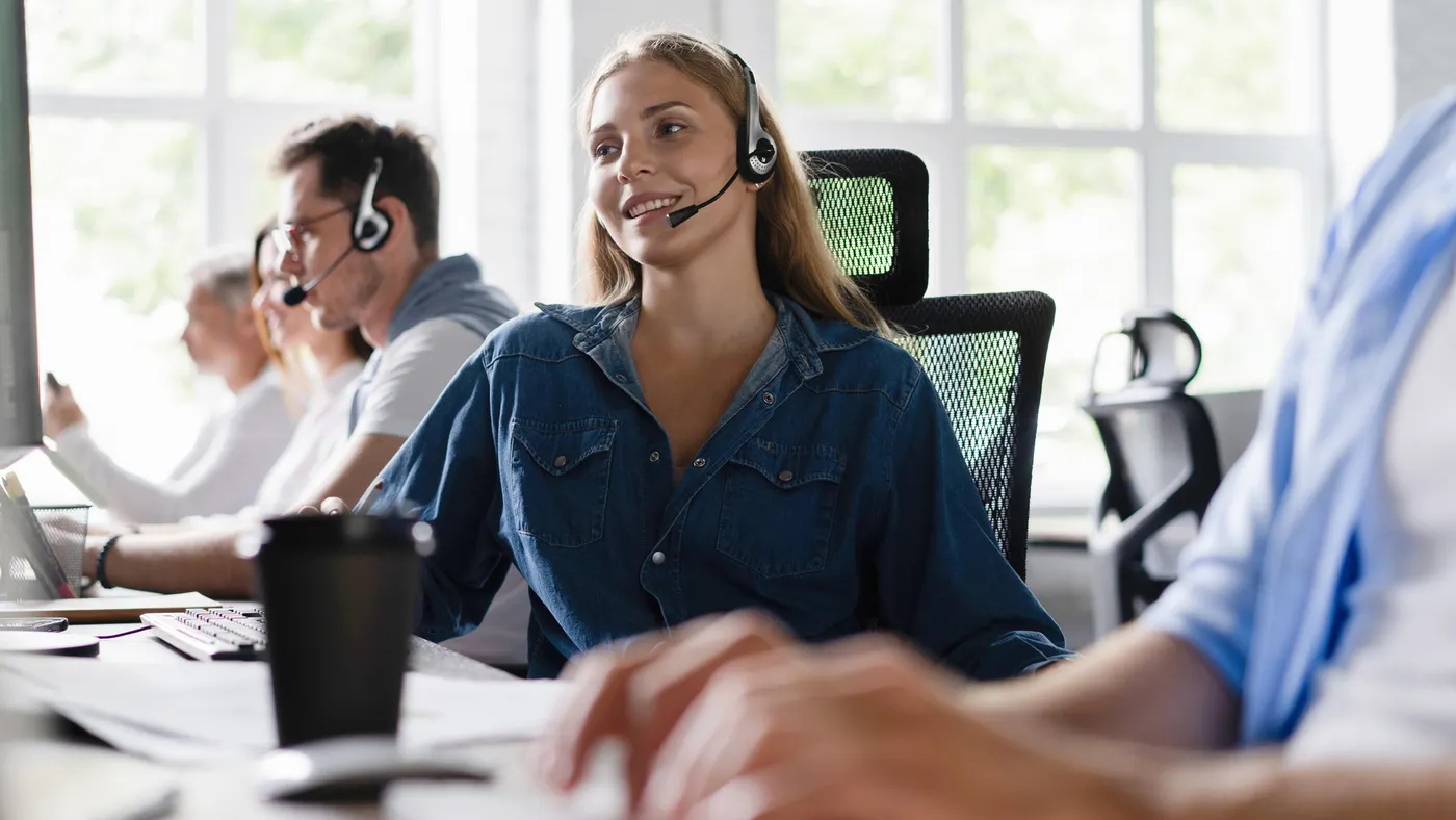 Agent with headsets work in a contact center