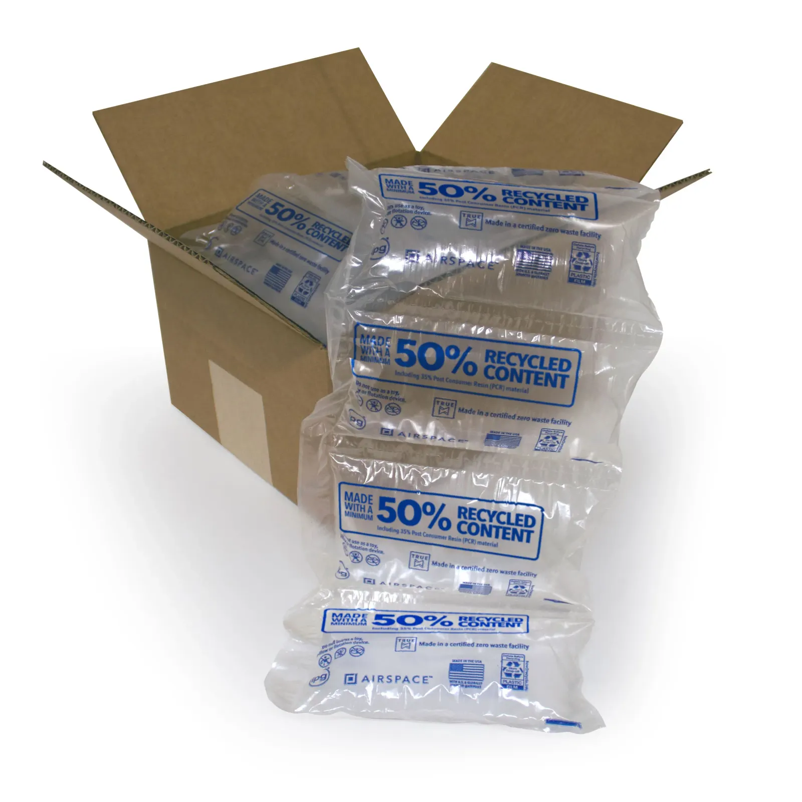 A cardboard box contains clear, plastic, void-fill air pillows that have messaging saying "50% recycled content."