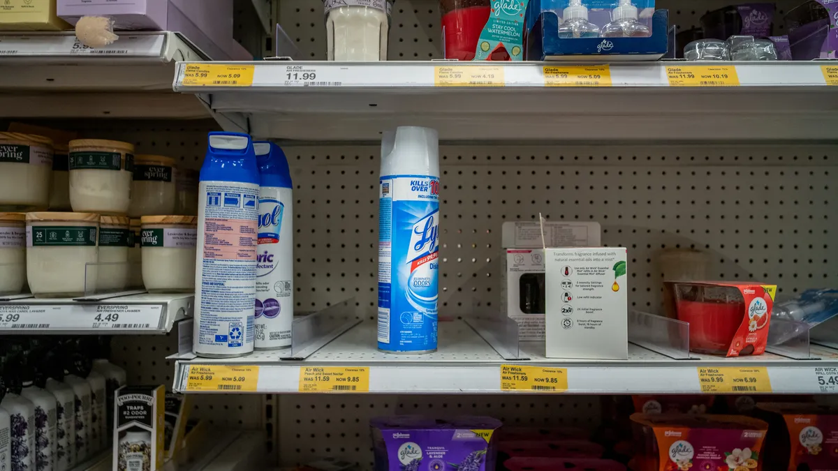 Lysol products are seen on a store shelf.