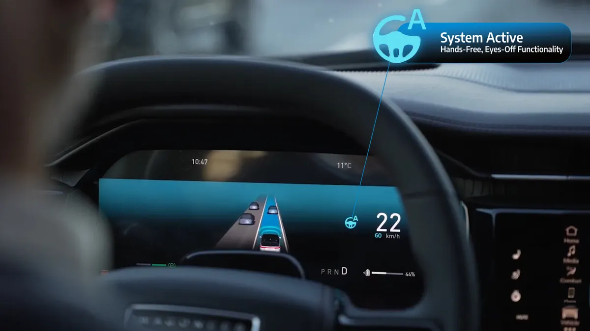 The instrument cluster of a Jeep Wagoneer showing an indicator that Stellantis' hands-free drive feature is active.