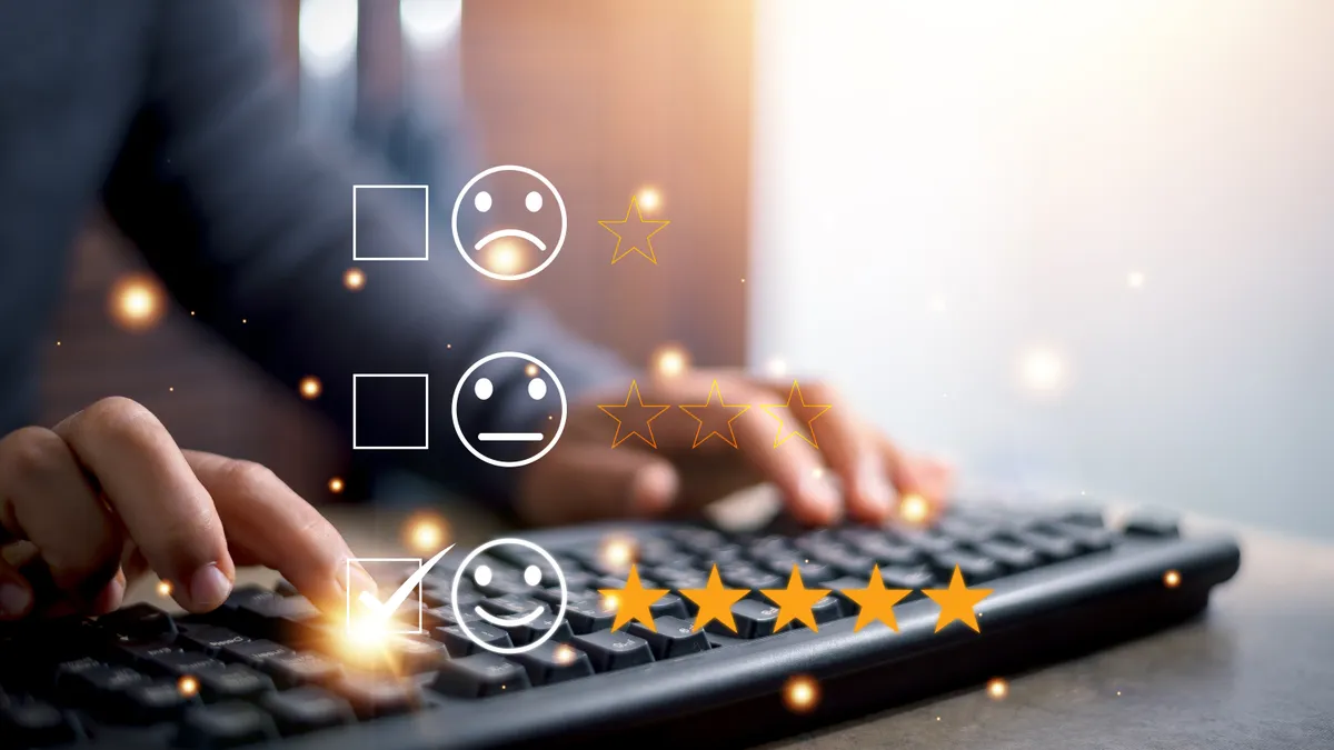 Person using a keyboard with 3 digital options to choose indicating experience. they selected a smily face with five star rating.