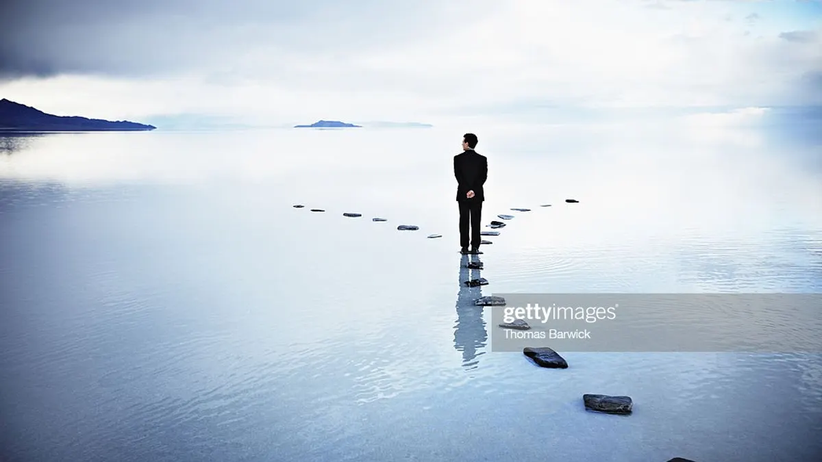 A business leader at a fork in the road.