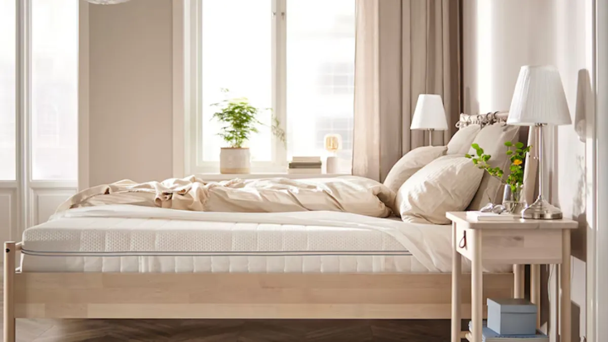 A bedroom featuring an Ikea mattress.