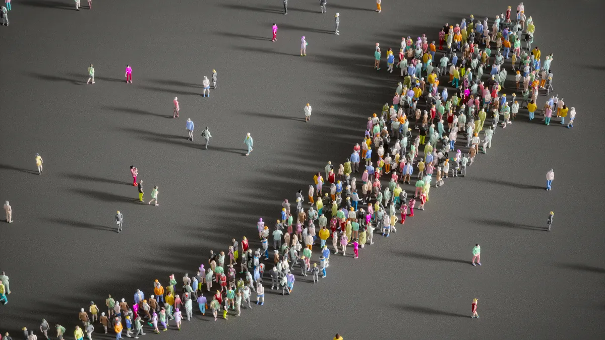 A group of people form a growing arrow