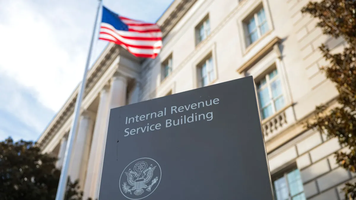 The IRS building pictured outside with an American flag
