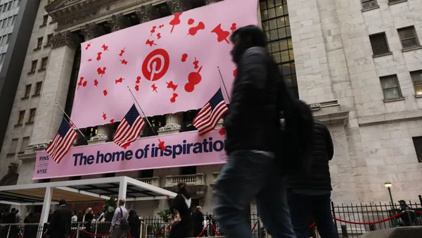 A Pinterest banner hangs from the New York Stock Exchange.
