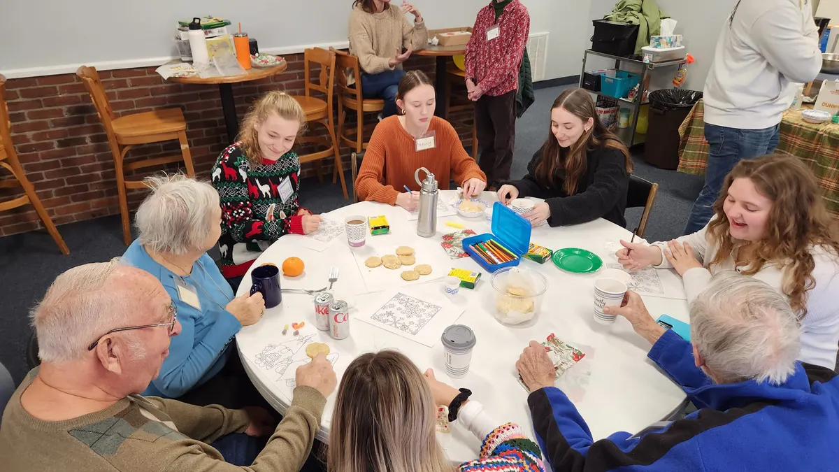 a group of people around a table