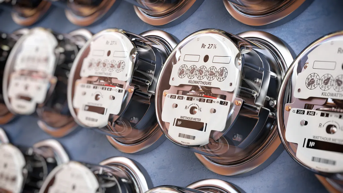 Electric meters in a row measuring power use. Electricity consumption concept. 3d illustration