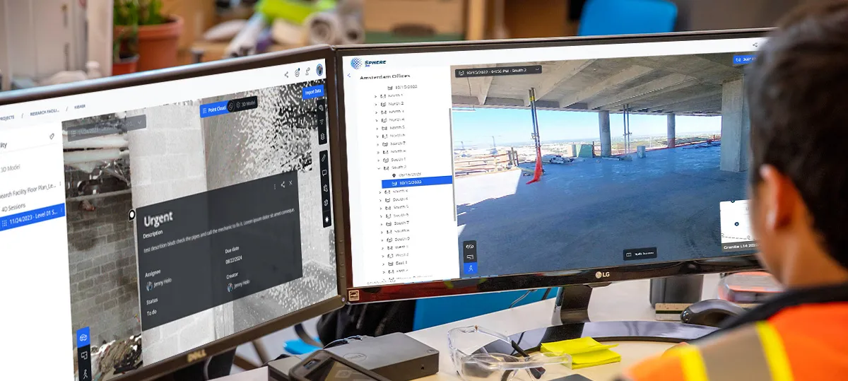 A person looking at a construction set up on two computer monitors.