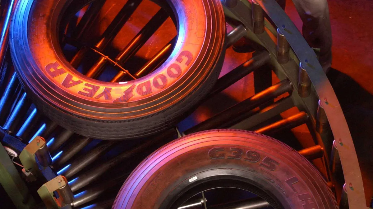 A Goodyear Tire & Rubber Company associate at a Danville, Virginia manufacturing plant as tires head toward inspection.