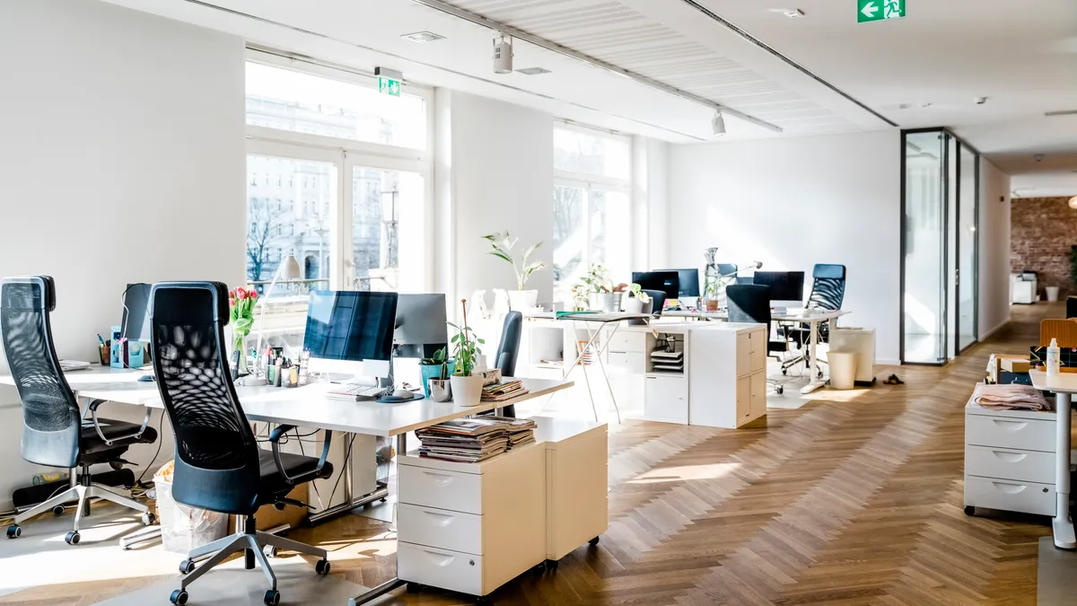 an empty office with an open floor plan