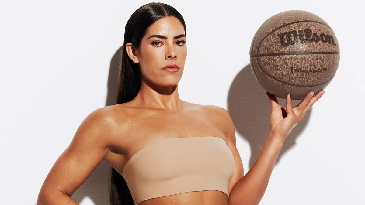 Kelsey Plum posing in Skims' latest campaign