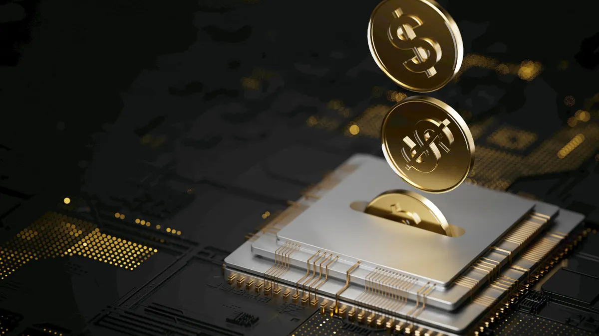 Gold coins with dollar signs dropping into a slot in a computer chip on a circuit board.