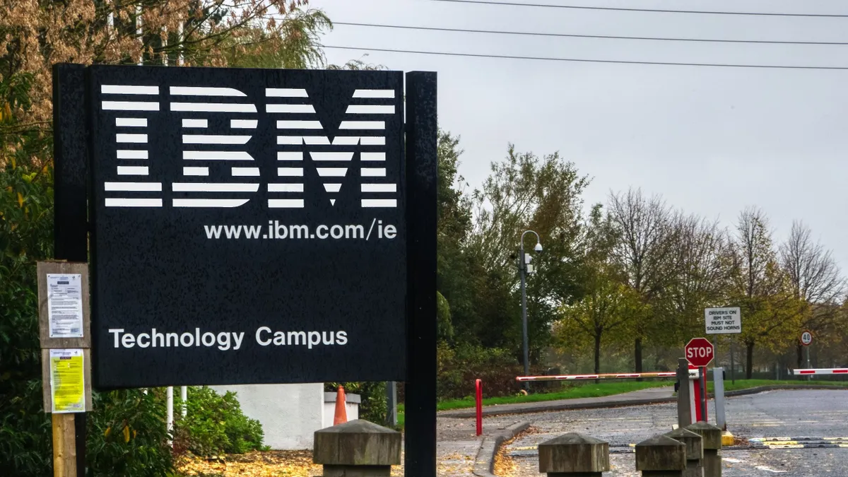 A sign with the IBM corporate logo stands outside of the company's Dublin, Ireland campus.