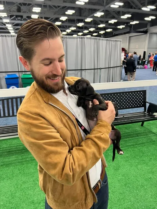 This is Diamondback. He and other puppies were available for petting — and adoption — at ATA MCE 2023.