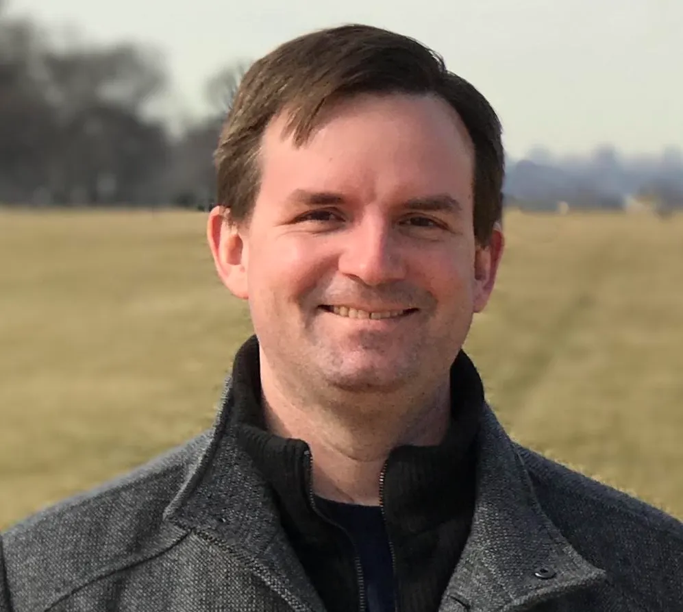 A headshot of Michael Howell.
