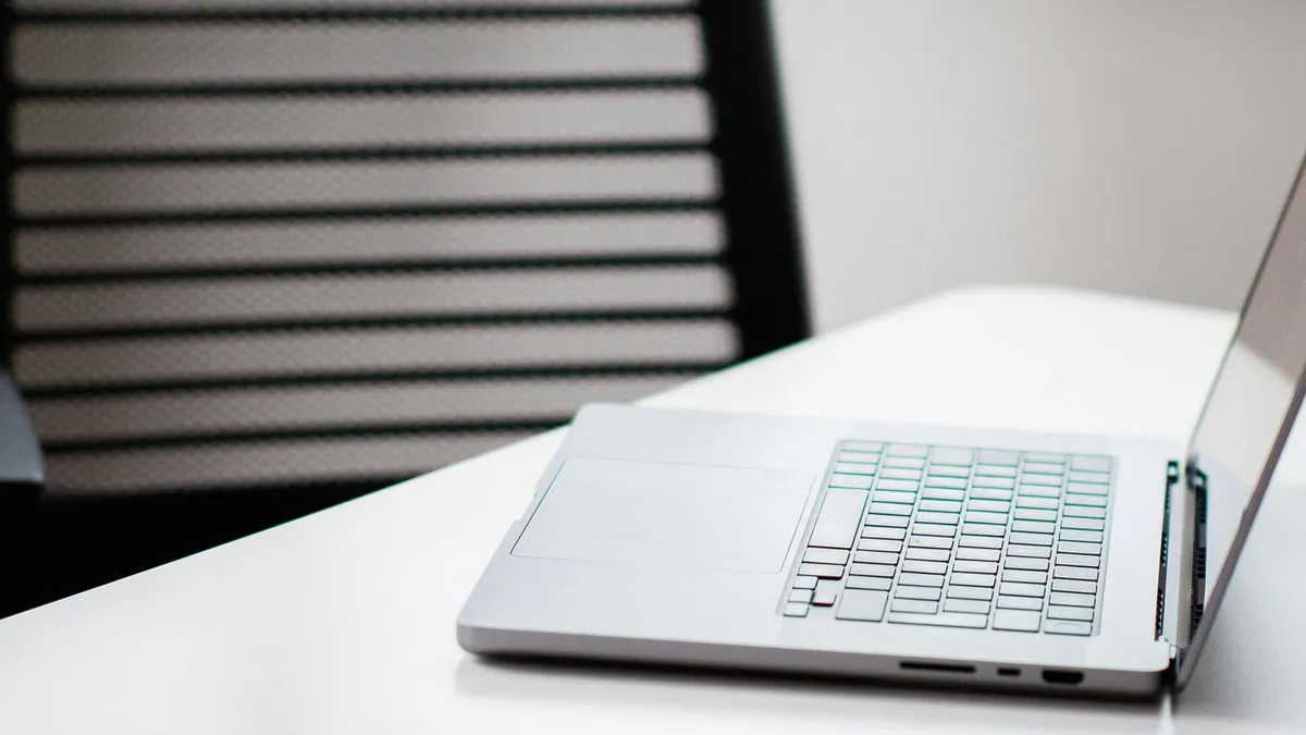 Laptop on a white table