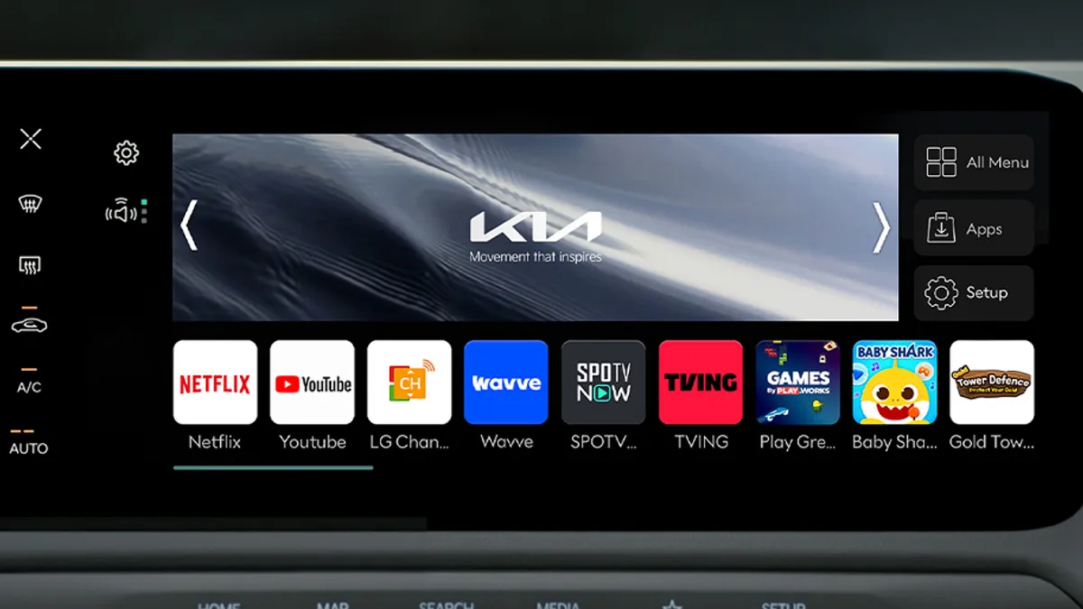 The entertainment screen of the Kia EV3 showing icons of streaming apps for Netflix, YouTube and others.