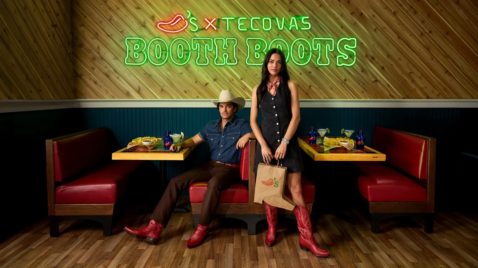 Two people wearing boots from Chili&#x27;s and Tecovas&#x27; partnership