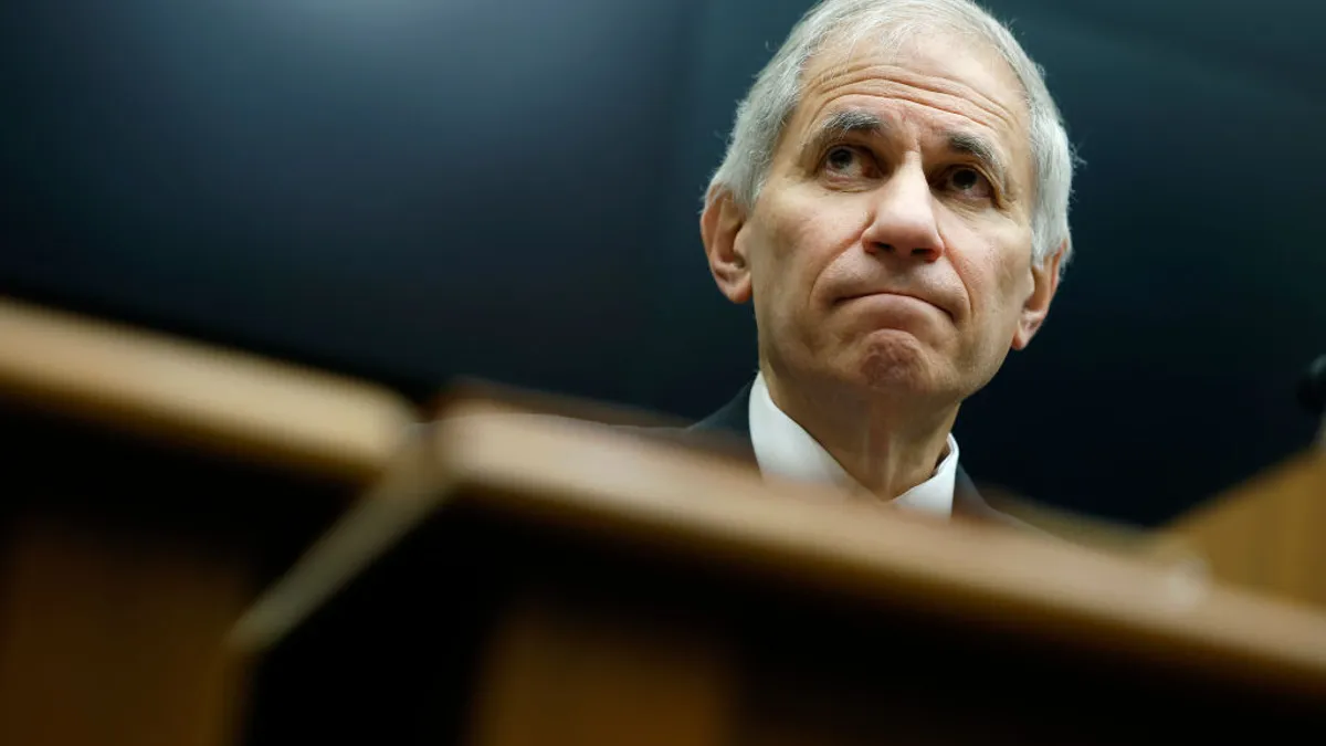 Federal Deposit Insurance Corp. Chairman Martin Gruenberg sits at a table.