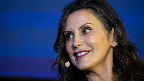 A close-up shot of Gretchen Whitmer smiling.
