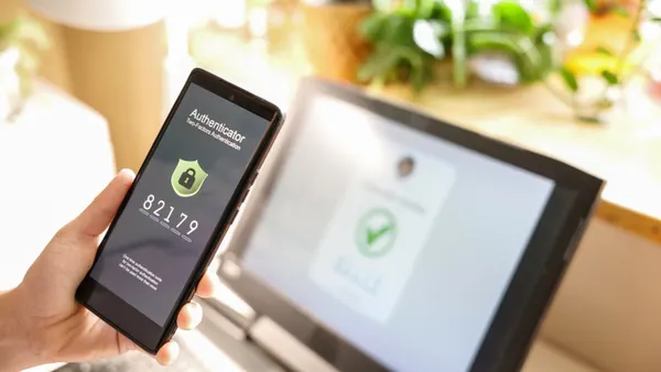 Hand successfully using AI authentication app and verifying passcode for digital network security.