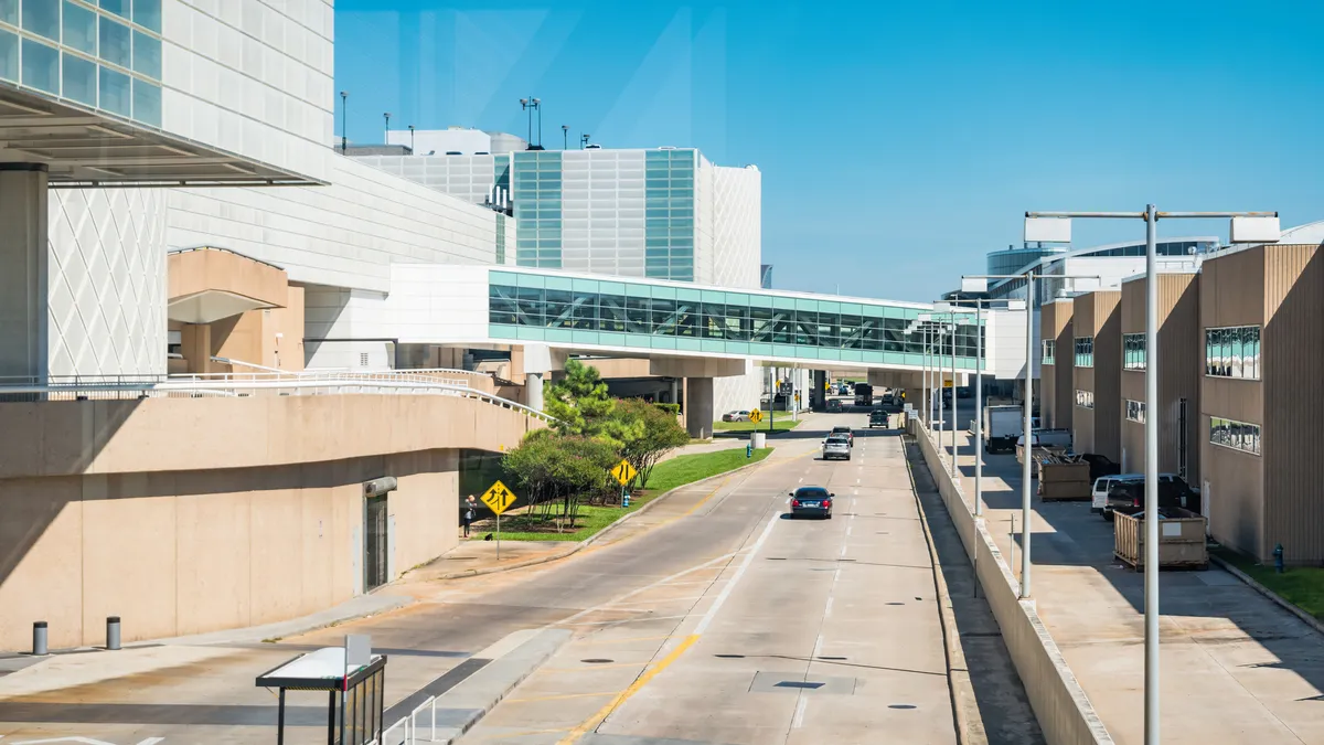 A photo shows the entrance to George Bush Intercontinental Airport in Houston.