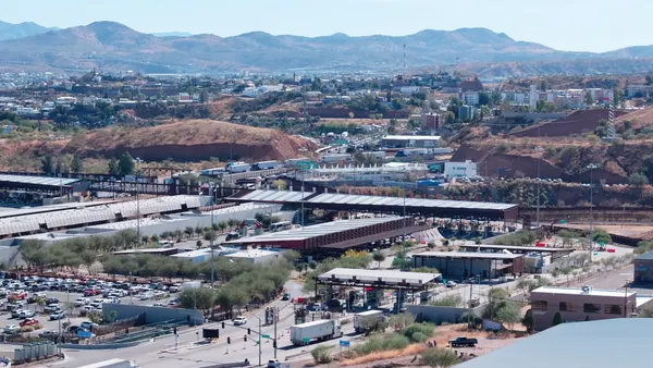 An aerial view showing traffic at a U.S.-Mexico port of entry.