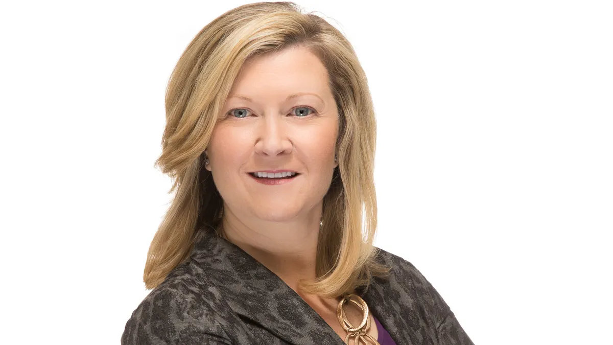 A portrait of Jodie Morrison, acting CEO of Q32 Bio.