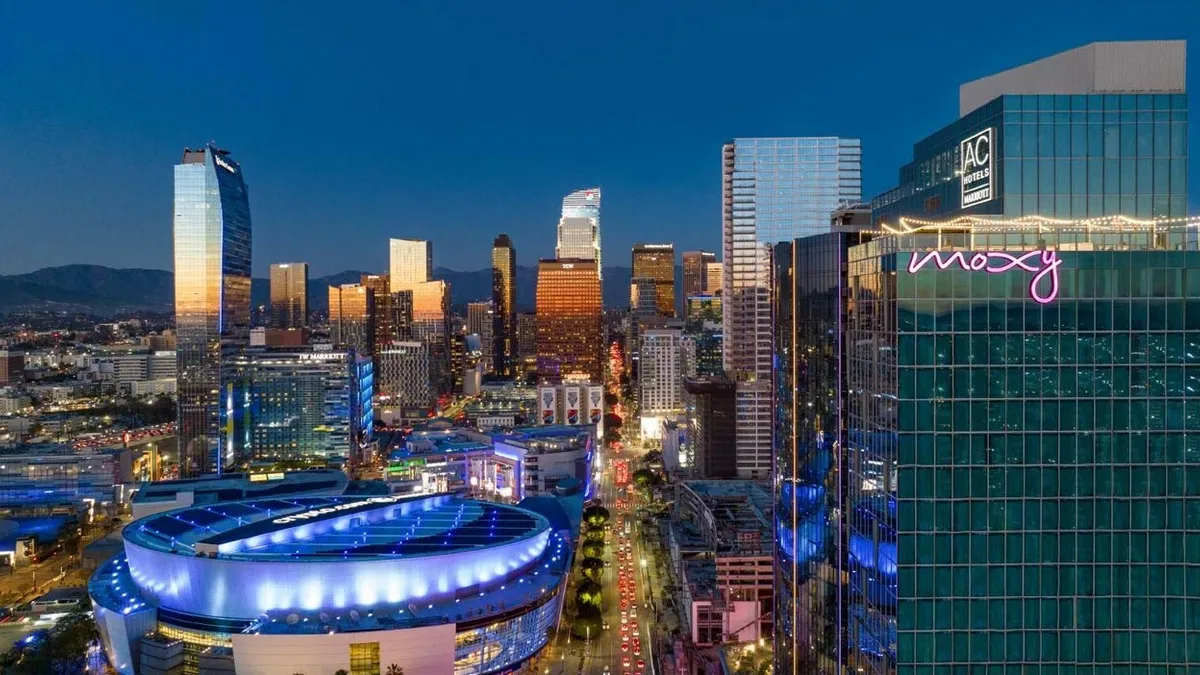 Image of Moxy hotel exterior and Los Angeles skyline