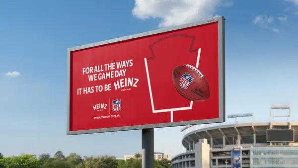 A mock-up of a Kraft Heinz billboard outside a football stadium
