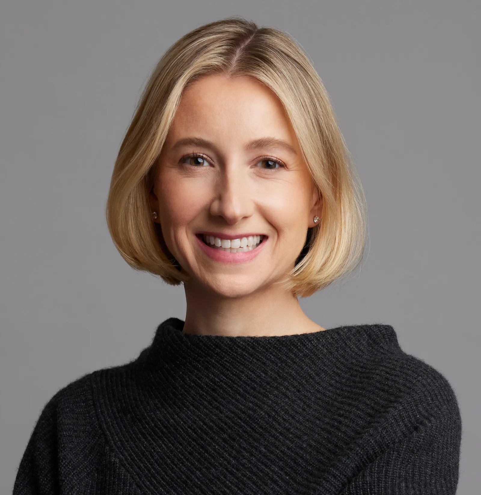 A portrait photo of Sara Griffin chief marketing and analytics officer of Saks Off 5th