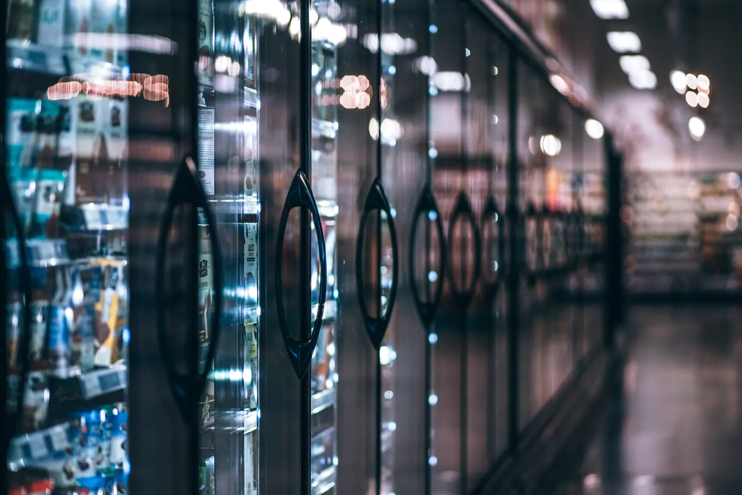 Frozen section in a grocery store.