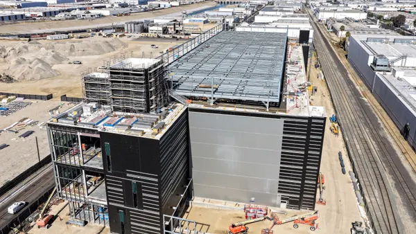 An aerial view of a three-level data center under construction