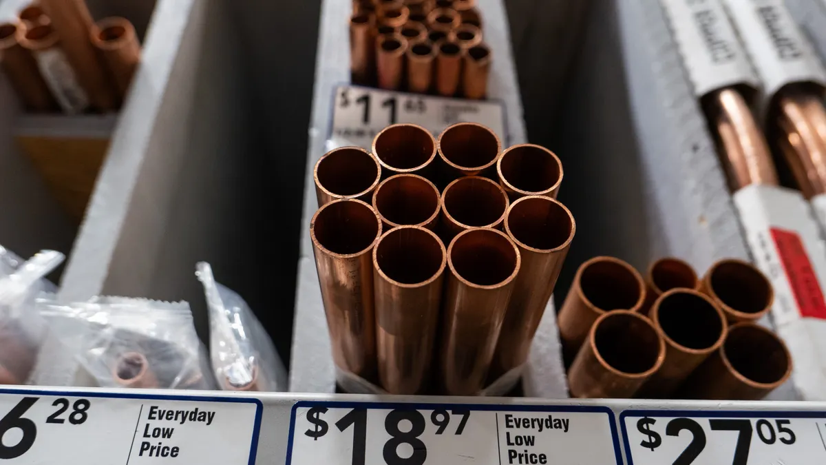 Copper pipes on display at a home rebuilding store