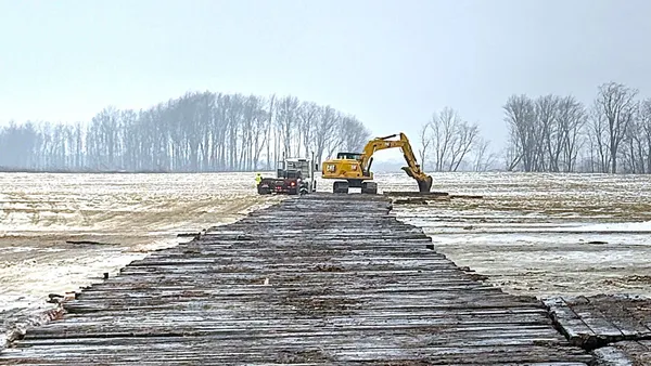 A digger moves earth.