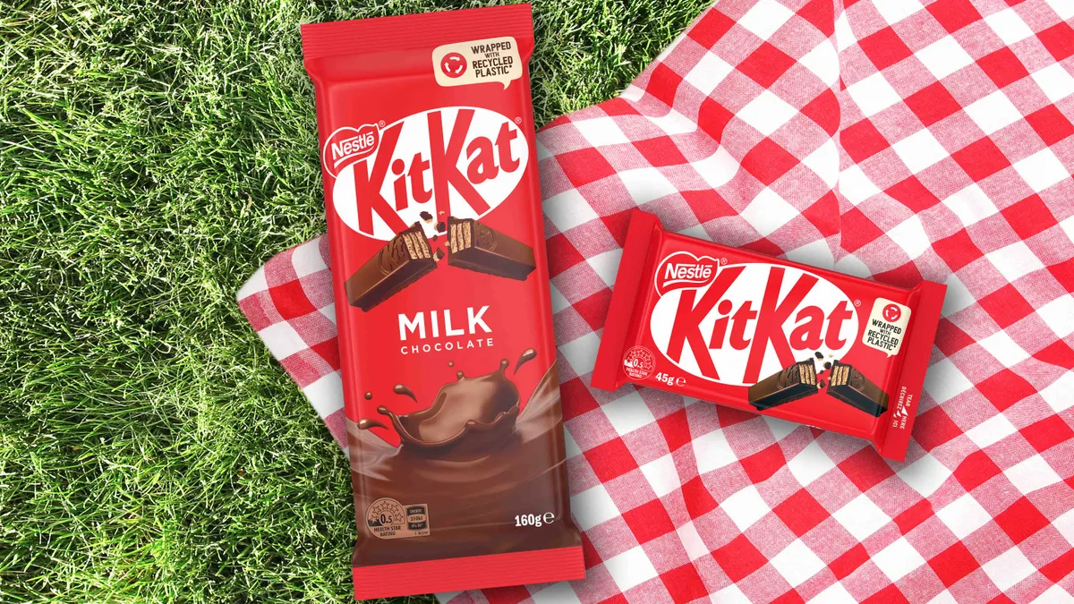 Milk chocolate KitKat bars wrapped in wrappers made with recycled plastic