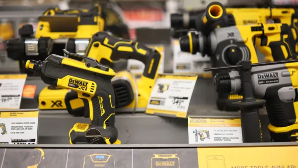 Power tools are displayed at a retail store.