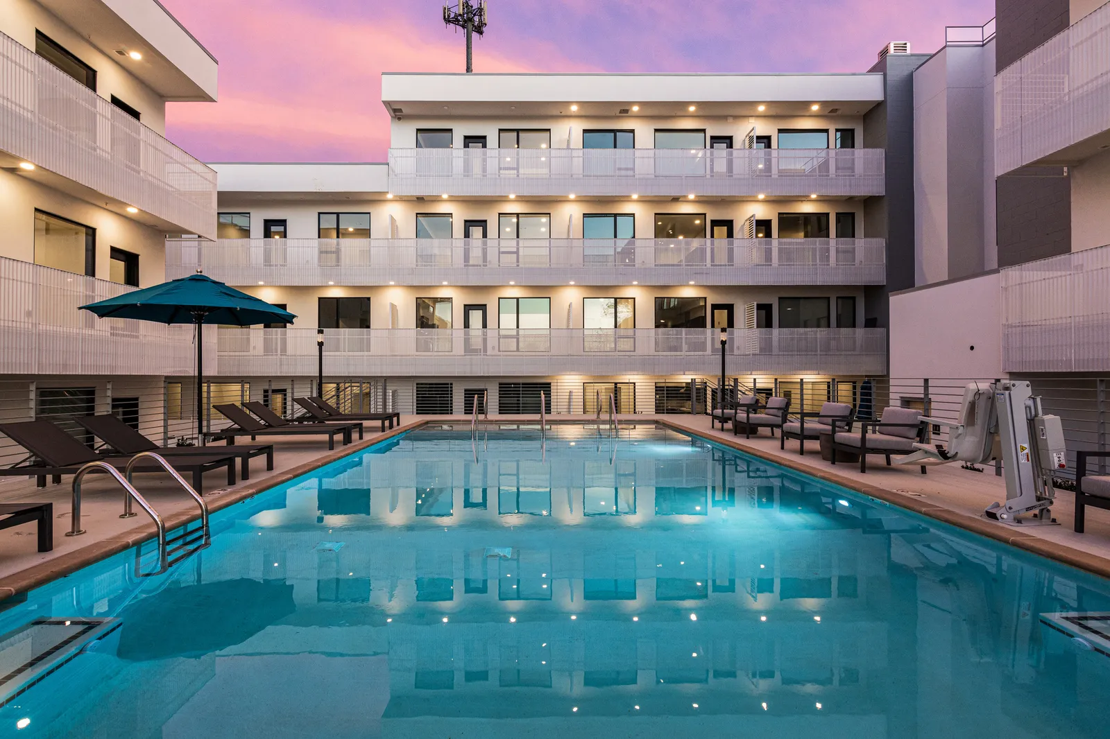 A mid-rise apartment building's pool deck.