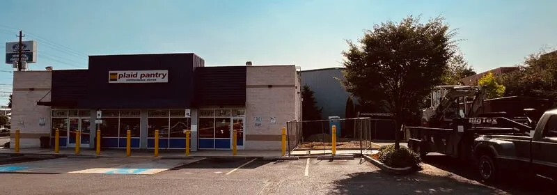 A photo of the exterior of a Plaid Pantry c-store location.